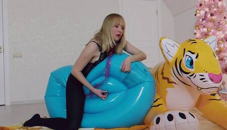 Alla blows away a rare inflatable raft and an inflatable tiger