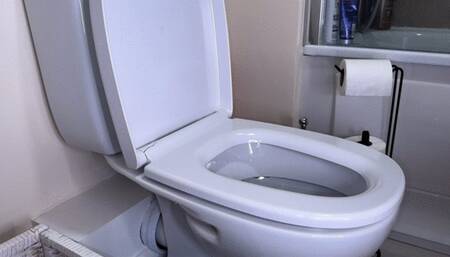 Girl peeing in red shorts panties