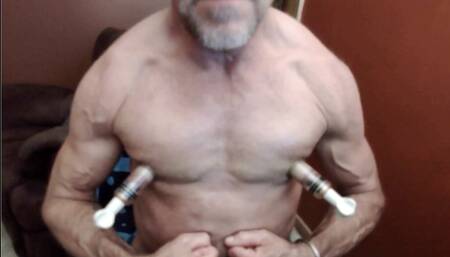 Gay Nipple Pig pumping up his giant nipples