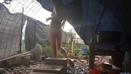Outdoor shower nudist paradise
