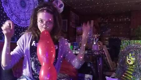 Hairy Hippie Looner Girl With Dreadlocks Inflates Red Balloon