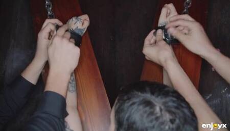 Obedient tattooed slut gets gagged and dominated by two rough guys in BDSM style