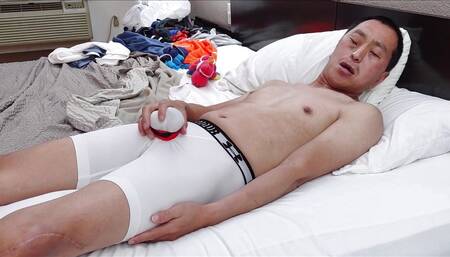 Hot Asian Lubing up His White Compression Shorts and Shoving 3 Butt Plugs up Butt