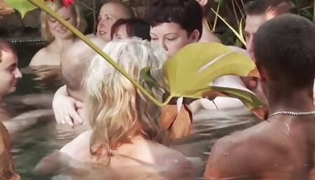 Cute teen couple plays games in the pool