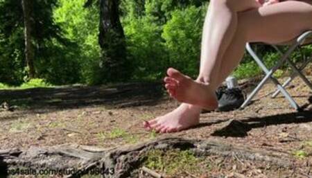 Dirty feet cleaning after forest walk