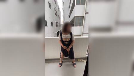 Standing masturbation on the balcony