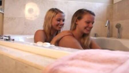 Cute tabby goes lesbo in the tub and plays