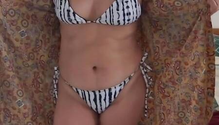 On the beach my beautiful wife shows off in a bikini and makes my cocks really hard