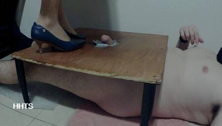 Mean and sexy hotel clerk does a harsh shoejob with her kitten heels