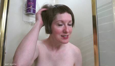 Shampooing dry hair and shaving sideburns and nape in the shower while topless