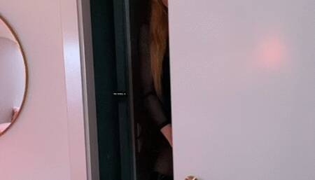 Catwoman is licking her banana