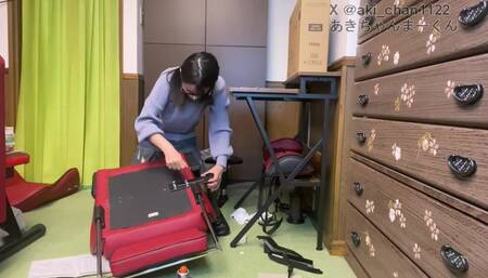 A girl assembles furniture. A video where you can enjoy panty shots. Gaming chair edition