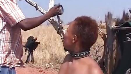 Short-haired ebony German slut spanked hard outdoors