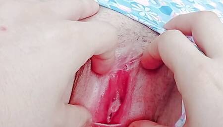innocent pussy, pink, tight and with some hair, I open it so you can see close-up
