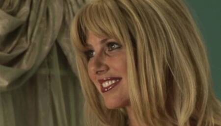 Busty blonde with shaved pussy Penny Porsche is fucking with a toy