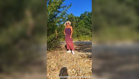 Outdoor stiptease and masturbation on the beach