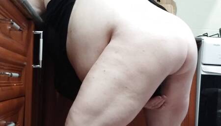 girlfriend masturbates with toys in the kitchen