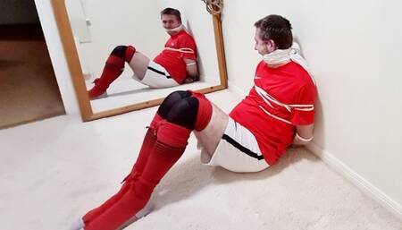 Bound and helpless in the mirror
