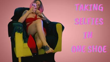 Lady Angela Your domme girlfriend is taking selfies in one shoe skneel in front of your fetish goddess and worship her soles – dangling red bottom heels