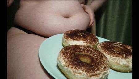 Fat greedy girl eats donuts in sexy lingerie
