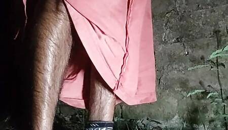 a desi boy exploring the world of sex toys in an outdoor setting at night. The boy will be discussing and demonstrating various
