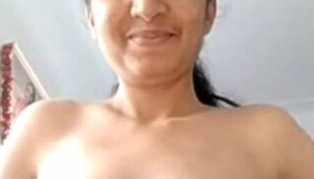 Sexy indian girl removing clothes getting naked showing big boobs