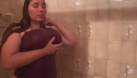 Jen puts on water tits to shower and blow