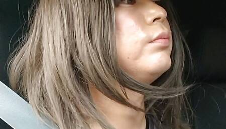 A cross-dressing boy drives down a steep mountain road.