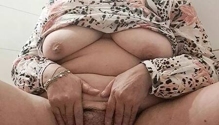 The pussy is very wet from being hot and released the stream of urine