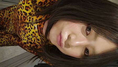 A Japan cross-dressing boy took off his dress, changed into leopard print full-body tights, and masturbated.