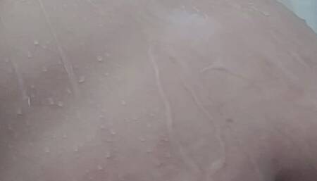 Feeling the warm water fall all over my body at the shower