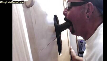Horny DILF cocksucking BBC in gloryhole