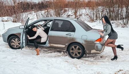 CAR STUCK Girlfriends get stuck in the snow in high heels