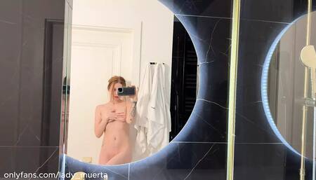 Hot Milf slowly dances striptease in front of the mirror in sexy white lingerie