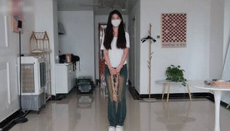 xy297 - cute girl in jeans tied with ropes on bed