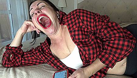 yawning in bed lying down