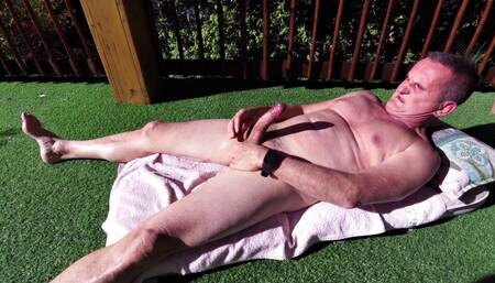 Suntanning Naked and Shooting a Big Load