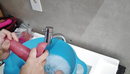 Camgirl showing everyday life, talking and cleaning toys