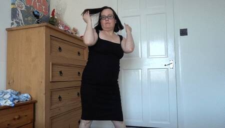 Dancing Striptease in sexy little tight black dress