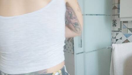 Steam swirled gently through the air as the woman stepped into the shower