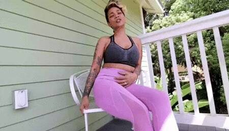INEED2PEE Loosey Lu wetting pink yoga pants on balcony
