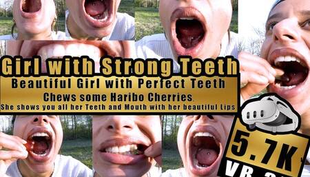 VR 3D 6K - Beautiful Girl shows her perfect teeth and bites, chews, squashes with her Strong Teeth very close to the camera Haribo Happy Cherries