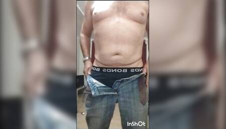 Older guy taking off his jeans and jocks cos he wants to feel his cock in the night air. Shakin' his slackie