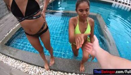 Bisexual amateur Thai girls in a threesome with a big white cock