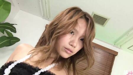 Asian Babe Akiho Nishimura Gives Him a Footjob Before Riding Dick
