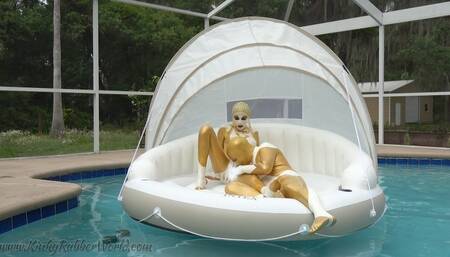 The Egyptian Latex Princess is riding the Latex Prince outdoors