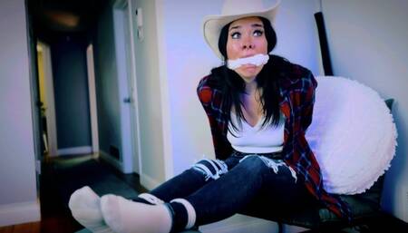 Rancher’s Stinky Step-Daughter Stolen For Ransom (1080p) - Jasmin Jai - cowboy boots, cowboy hat, body odor, hand over mouth, on-screen gagging, rope bondage, knotted cleave gag