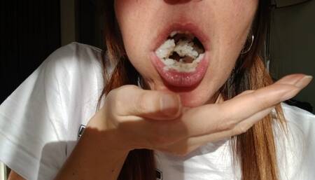 Lania eating salmon onigiri