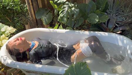 Captured Hiking Girl Tied Outside in Dirt and Bathtub – Socks, Gag, Wet Struggle