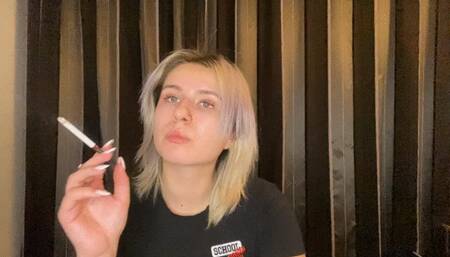 Smoking while looking into your soul''